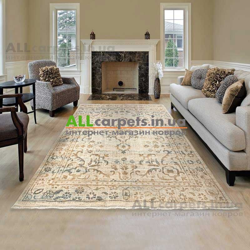 Дизайнерські поради як вибрати килим у вітальню під колір стін та меблів